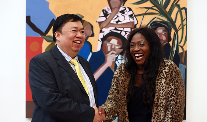 Joy Labinjo and Mr Wee Teng Woon, sponsor of the Woon Prize. Image courtesy of NCJ media